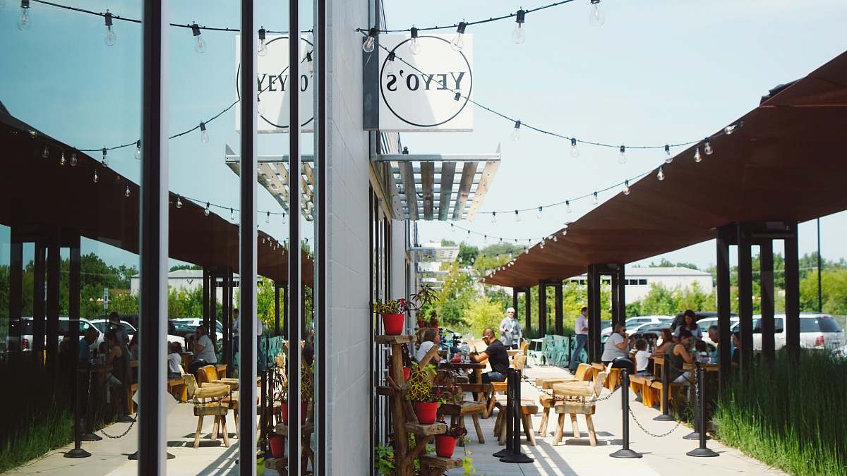 yeyo's mexican grill photo of person eating in Yeyo's store bentonville